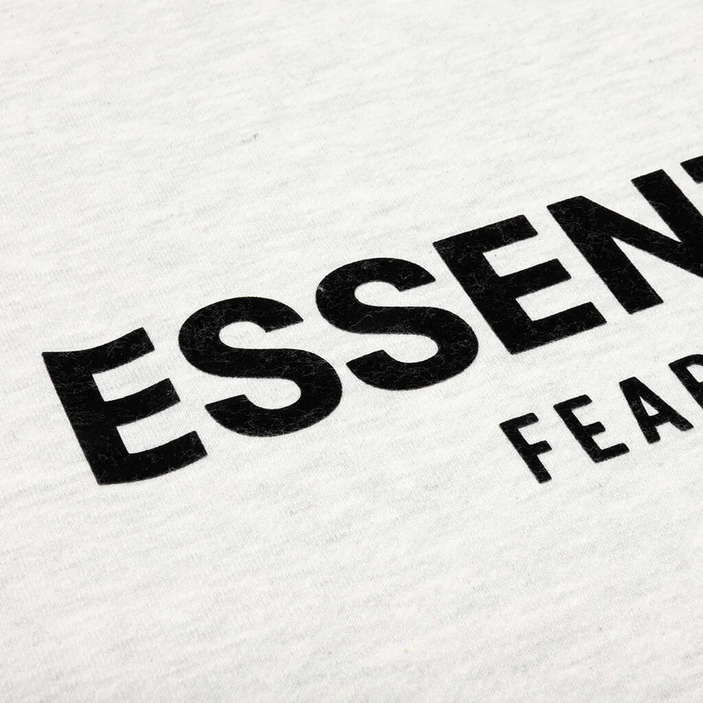 products/Fear-of-God-Essentials-Core-Collection-Pullover-Hoodie-Light-Heather-Oatmeal-THE-GARDEN-867.png