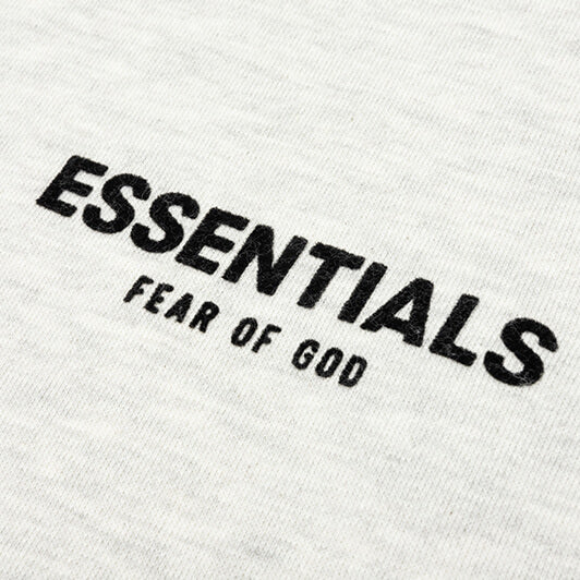 Fear of God Essentials Core Collection Pullover Hoodie Light Heather Oatmeal THE GARDEN